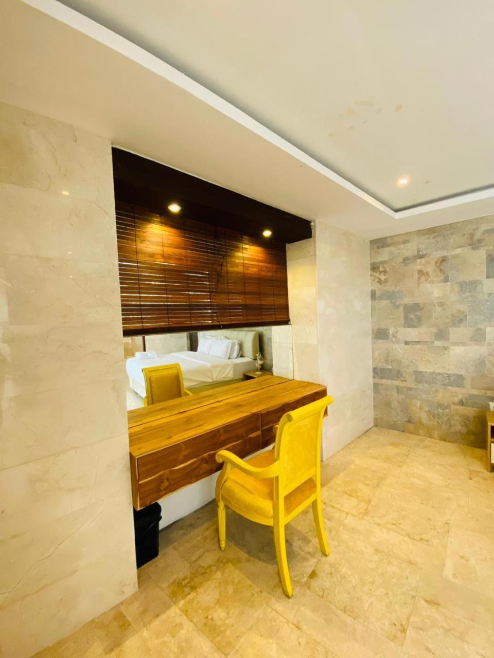 Puri Ratu Jimbaran Hotel Exterior photo